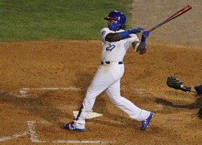 Buffalo Bisons third baseman Vladimir Guerrero jr. (27) follows through on a sacrifice fly during the sixth inning of the team’s Triple-A baseball game against the Lehigh Valley IronPigs, Tuesday, July 31, 2018, in Buffalo N.Y. (AP Photo/Jeffrey T. Barnes)