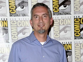 FILE - In this July 11, 2015 file photo, James Dashner, author of "Maze Runner" attends the 20th Century Fox press line at Comic-Con International in San Diego.  Dashner tweeted late Thursday, July 5, 2018  that he was working on new material and wasn't using notes as a guide for his new project, which would be the first since he was dropped by publisher Three Penguin Random House imprints over sexual misconduct allegations in February.