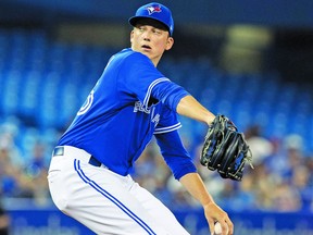 Toronto Blue Jays starting pitcher Ryan Borucki throws against the Detroit Tigers in the seventh inning of their American League MLB baseball game in Toronto on Monday July 2, 2018. Fred Thornhill/The Canadian Press