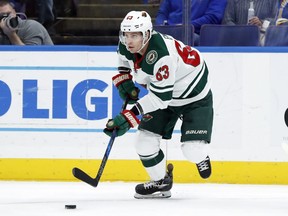 In this Nov. 25, 2017, file photo, Minnesota Wild's Tyler Ennis controls the puck during the first period of an NHL hockey game against the St. Louis Blues in St. Louis. (AP Photo/Jeff Roberson, File)