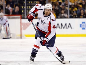 In this April 8, 2017, file photo, Washington Capitals defenceman Brooks Orpik lets go a shot against the Boston Bruins in Boston.