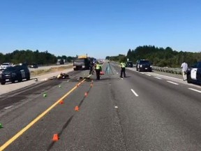 The scene of a fatal collision between a motorcycle and a dump truck on Hwy. 407 in Pickering on Monday, July 9, 2018. (OPP_HSD/Twitter)