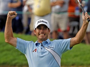 Chez Reavie celebrates winning the Canadian Open after the final round at Glen Abbey on July 26, 2008. (Dave Abel/Toronto Sun)