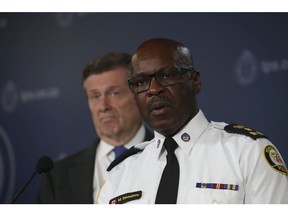 Toronto Police Chief Mark Saunders and Mayor John Tory announce a gun violence reduction strategy at a news conference on Thursday, July 12, 2018. (Jack Boland/Toronto Sun/Postmedia Network)