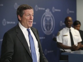 Toronto Police chief Mark Saunders and the the city's mayor John Tory have come together with anew eight-week initiative to tackle crime and gun violence. They are allocating millions of dollars to youth programs and putting 200 officers on OT shifts in high crime areas.on Thursday July 12, 2018. Jack Boland/Toronto Sun/Postmedia Network