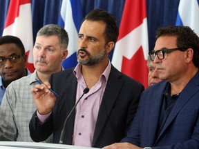 Councillor Justin Di Ciano, among other Toronto City Councillors show solidarity to Premier Doug Fords announcement to reduce city council to 25 wards in Toronto, Ont. on Friday July 27, 2018. (Dave Abel/Toronto Sun/Postmedia Network)