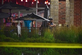 One person is dead after a shooting late Thursday night at the Slumdog Bar and Grill on Brisdale Dr. in Brampton. (Bryan Passifiume/Toronto Sun)