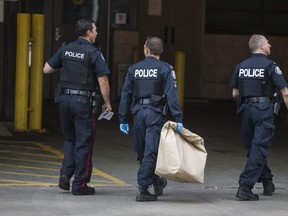 Toronto Police outside of St. Michael's Hospital in Toronto, Ont. on Monday, July 23, 2018. Ernest Doroszuk/Toronto Sun