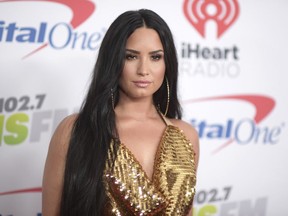 Demi Lovato arrives at Jingle Ball at The Forum in Inglewood, Calif. on Dec. 1, 2017.  (Photo by Richard Shotwell/Invision/AP, File)