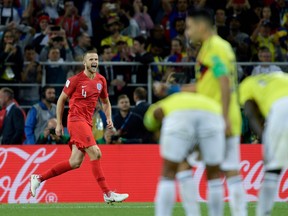 England's midfielder Eric Dier celebrates scoring during the penalty shootout versus at the Spartak Stadium in Moscow on July 3, 2018. (GETTY IMAGES)