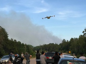 A water bomber fighting forest fires in Ontario. (ONforestfires/Twitter)