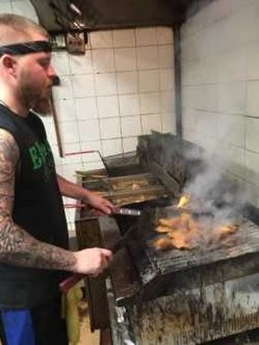 Elmo’s Ryan Stitt mans the grill