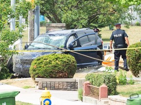 Toronto Police at the scene on Islington Ave. north of Finch after a man was shot and killed while driving on Wednesday, July 25, 2018. (Victor Biro/Special to the Toronto Sun)