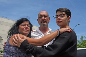 Maria Molinaro, left, Ernie Molinaro, centre, and Christian Molinaro outside the Wasaga Beach, Ont. courthouse after the sentencing of one of those accused in the 2016 stabbing death of Francesco Molinaro, 18. Tracy McLaughlin photo