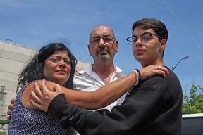 Maria Molinaro, left, Ernie Molinaro, centre, and Christian Molinaro outside the Wasaga Beach, Ont. courthouse after the sentencing of one of those accused in the 2016 stabbing death of Francesco Molinaro, 18. (Tracy McLaughlin photo)