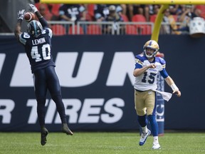 Winnipeg Blue Bombers quarterback Matt Nichols has a pass blocked by Toronto Argonauts' Shawn Lemon during the first half of CFL football action in Toronto, Saturday July 21, 2018. THE CANADIAN PRESS/Mark Blinch