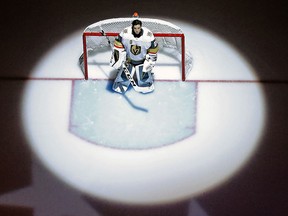 In this Feb. 6, 2018, file photo, Vegas Golden Knights goaltender Marc-Andre Fleury stands during the national anthem before a game in Pittsburgh. (AP Photo/Gene J. Puskar, File)