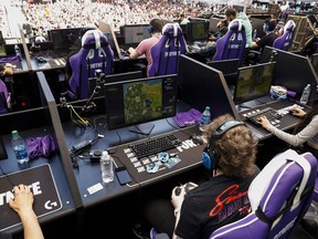 Attendees play in the Epic Games Inc. Fortnite: Battle Royale Celebrity Pro Am on the sideline of the E3 Electronic Entertainment Expo in Los Angeles on June 12, 2018. (Patrick T. Fallon/Bloomberg)