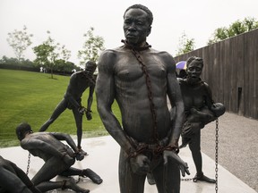 A sculpture commemorating the slave trade greets visitors at the entrance National Memorial For Peace And Justice on April 26, 2018 in Montgomery, Alabama. The memorial is dedicated to the legacy of enslaved black people and those terrorized by lynching and Jim Crow segregation in America. Conceived by the Equal Justice Initiative, the physical environment is intended to foster reflection on America's history of racial inequality. (Bob Miller/Getty Images)