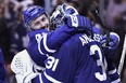 Toronto Maple Leafs centre Tyler Bozak (42) and goaltender Frederik Andersen (31) celebrate their win over the Boston Bruins in NHL round one playoff hockey action in Toronto on Monday, April 23, 2018. THE CANADIAN PRESS/Frank Gunn