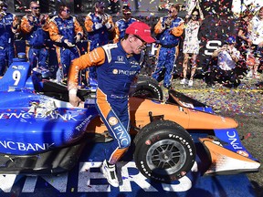 Scott Dixon celebrates after winning the Honda Indy in Toronto on Sunday, July 15, 2018. THE CANADIAN PRESS/Frank Gunn