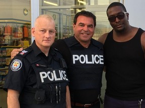 Toronto city Coun. Giorgio Mammoliti during his police ride-along Friday evening with Sgt. Paul Dominey, left, and a member of the community. (Giorgio Mammoliti photo)
