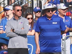 Buffalo Bills GM Brandon Beane (left) and Bills co-owner Terry Pegula.  (JOHN KRYK/Postmedia)