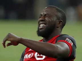Toronto FC's Jozy Altidore grimaces in pain during the CONCACAF Champions League final soccer match against Chivas, in Guadalajara, Mexico, on April 25, 2018. Reinforcements will soon be on the way for an injury-plagued Toronto FC side that has struggled mightily over the first half of the Major League Soccer season. (EDUARDO VERDUGO/AP files)