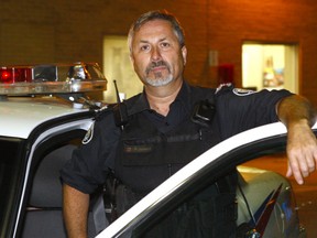 Toronto Police Sgt. Mark Hayward, seen here during a ride-along in the summer of 2014, a 37-year veteran who spent six years leading a TAVIS Rapid Response Team until the initiative was disbanded at the end of 2016. (Chris Doucette/Toronto Sun/Postmedia Network)