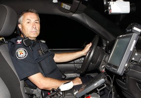 Toronto Police Sgt. Mark Hayward is seen here during a ride-long with his TAVIS Rapid Response Team in 2012. (CHRIS DOUCETTE/TORONTO SUN)