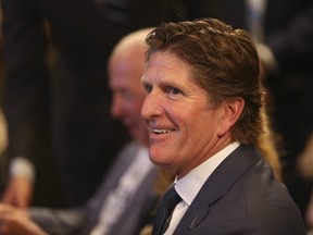 Maple Leafs head coach Mike Babcock was all smiles as the team announced the signing of free agent centre John Tavares to a seven-year, $77 million contract in Toronto on Sunday, July 1, 2018.