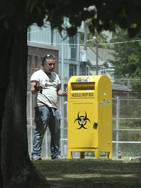 A used needle drop box in Toronto’s Moss Park. (Jack Boland/Toronto Sun)