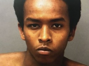 Abdulkadir Handule, 22, of Toronto is wanted for two counts of First-Degree Murder and one count of Attempt Murder  in conenction with the deadly June 30 2018 triple-shooting on Queen St. and Peter St. (Toronto police handout)