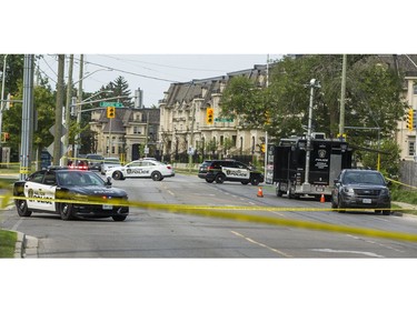 Halton Regional Police at the scene of a homicide in the area of Rebecca St., east of Dorval Dr. in Oakville, Ont. on Saturday July 14, 2018. Ernest Doroszuk/Toronto Sun/Postmedia
