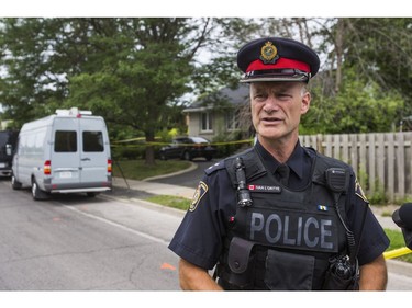 Halton Regional Police Insp. Ivan LÕOrtye updates media at the scene of a homicide in the area of Rebecca St., east of Dorval Dr. in Oakville, Ont. on Saturday July 14, 2018. Ernest Doroszuk/Toronto Sun/Postmedia