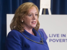Lisa Macleod, Ontario's Children, Community and Social Services Minister makes an announcement on welfare rates at the Ontario Legislature in Toronto on Tuesday July 31, 2018. THE CANADIAN PRESS/Chris Young