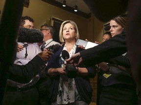 Ontario NDP leader Andrea Horwath speaks to the media on the first day back at the Queen's Park Legislature. Conservative MPP Ted Arnott was the first matter of business and was elected as the new House Speaker on Wednesday July 11, 2018. Jack Boland/Toronto Sun/Postmedia Network