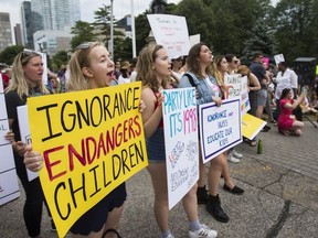 Rally in support of keeping the updated 2015 sex ed curriculum in Ontario schools held in front of Queen's Park in Toronto, Ont.  on Saturday July 21, 2018. Ernest Doroszuk/Toronto Sun/Postmedia