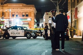 Toronto Mayor John Tory and police Chief Mark Saunders speak following a mass shooting in Toronto on Monday, July 23, 2018. THE CANADIAN PRESS/Christopher Katsarov
