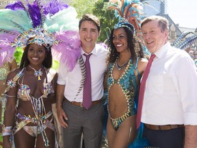 Prime Minister Justin Trudeau meets with Toronto Mayor John Tory at City Hall before meeting with organizers and volunteers of the Peeks Toronto Caribbean Carnival in Toronto, Ont. on Friday July 6, 2018. Stan Behal/Toronto Sun