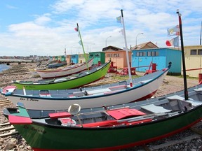 Colourful boathouses and boats welcome ferry passengers docking Saint-Pierre, pretty, little piece of France, just 55-minutes from Fortune, Nfld.