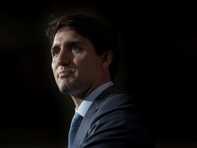 Canadian Prime Minister Justin Trudeau speaks to supporters at a Liberal Party fundraiser in Aurora, Ont., Friday, July 20, 2018.