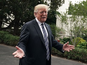 U.S. President Donald Trump gestures to an exhibitor during the 2018 Made in America Product Showcase July 23, 2018 at the White House in Washington, DC. (Alex Wong/Getty Images)