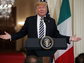 U.S. President Donald Trump speaks during a news conference with Italian Prime Minister Giuseppe Conte in the East Room of the White House, Monday, July 30, 2018, in Washington.