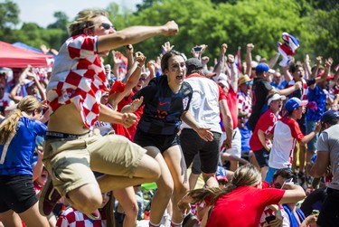 Croatian fans reacts to their team's first goal as they watch the World Cup Final against France on the big screen at Croatian Parish Park in Mississauga, Ont. on Sunday July 15, 2018. Ernest Doroszuk/Toronto Sun/Postmedia