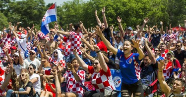 Croatian fans react to their team's second goal as they watch the World Cup Final against France on the big screen at Croatian Parish Park in Mississauga, Ont. on Sunday July 15, 2018. Ernest Doroszuk/Toronto Sun/Postmedia