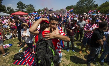 Croatian fans react after their team's loss to France after watching the World Cup Final on the big screen at Croatian Parish Park in Mississauga, Ont. on Sunday July 15, 2018. Ernest Doroszuk/Toronto Sun/Postmedia