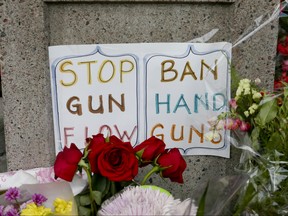 The Danforth memorial site for the victims of last Sunday's shootings continues to grow on Thursday, July 26, 2018 in Toronto. (Veronica Henri/Toronto Sun/Postmedia Network)