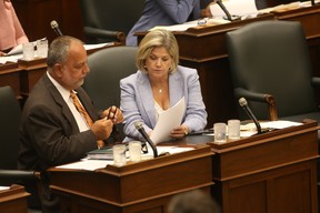 NDP Andrea Horwath discusses issues with Gilles Bisson on Monday July 30, 2018. (Jack Boland/Toronto Sun)