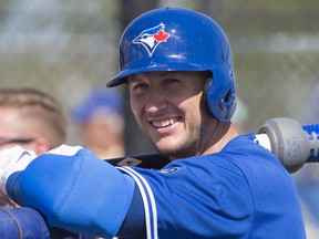 Toronto Blue Jays infielder Troy Tulowitzki leans on a batting cage at spring training in Dunedin, Fla. on Feb. 20, 2018. (FRANK GUNN/The Canadian Press files)